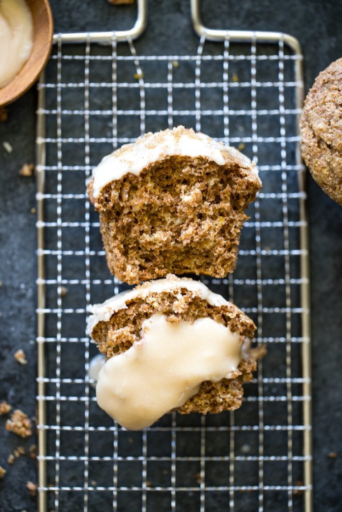 maple bran muffins on a cooling rack with maple frosting