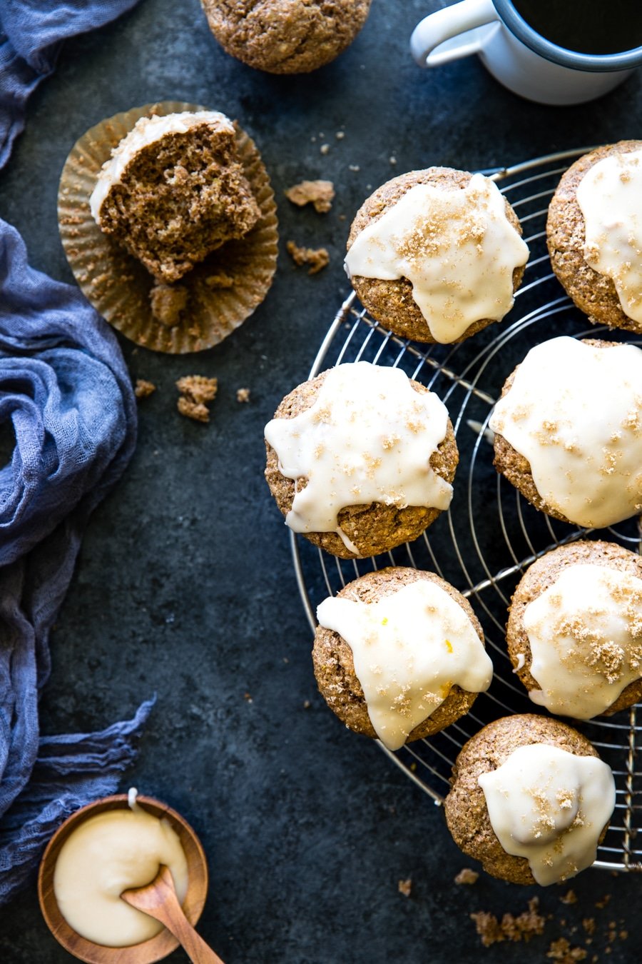 maple bran muffins with coffee on a cooling rack