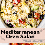 greek orzo pasta salad in a large white bowl