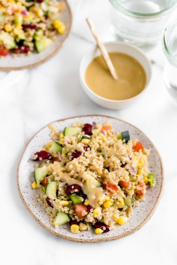 quinoa salad on a grey speckled plate