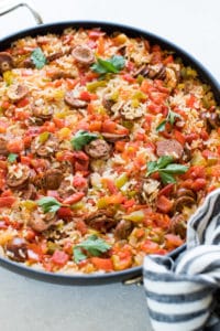 Sausage, Peppers and Rice in a large nonstick skillet topped with parsley