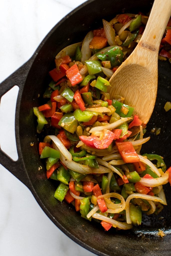 bell peppers in a cast iron skillet