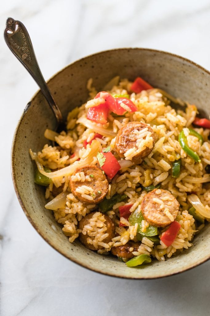 sausage, rice and bell peppers in a bowl