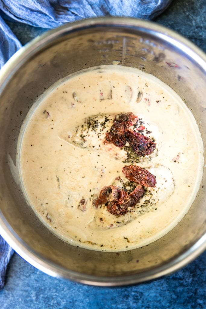 chicken in a creamy sun dried tomato sauce in an instant pot