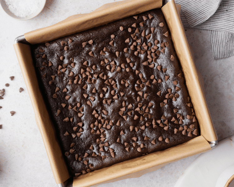 Black bean brownies baked in 8x8 metal pan.