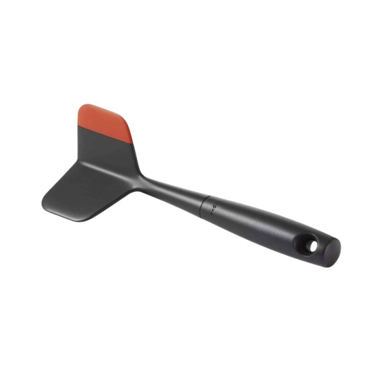 black ground meat chopper with a red tip