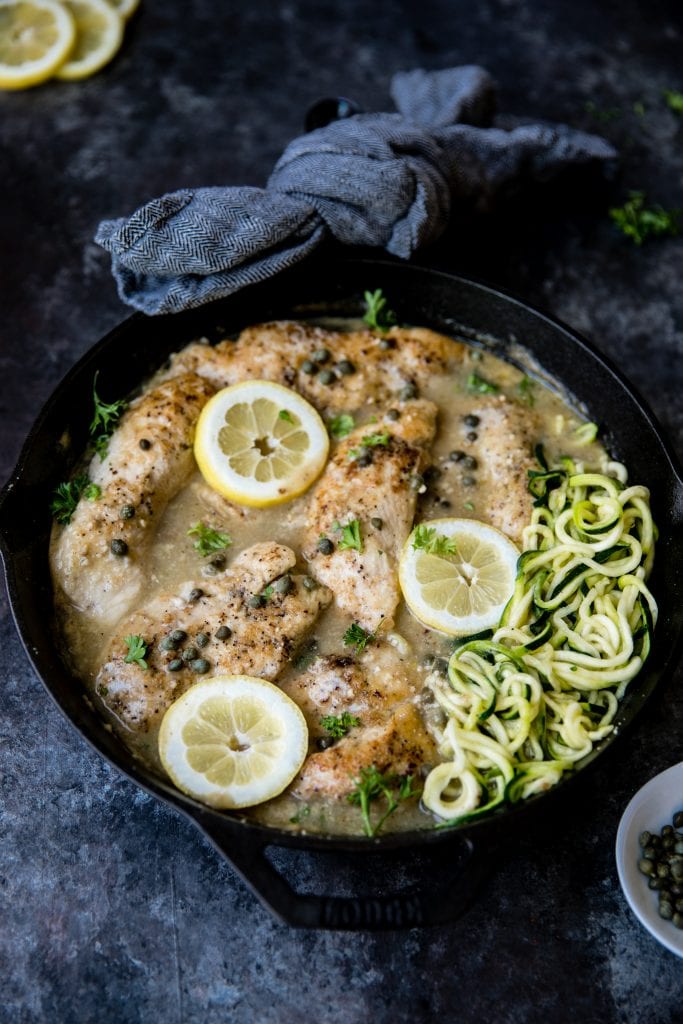 chicken piccata with zoodles in a cast iron