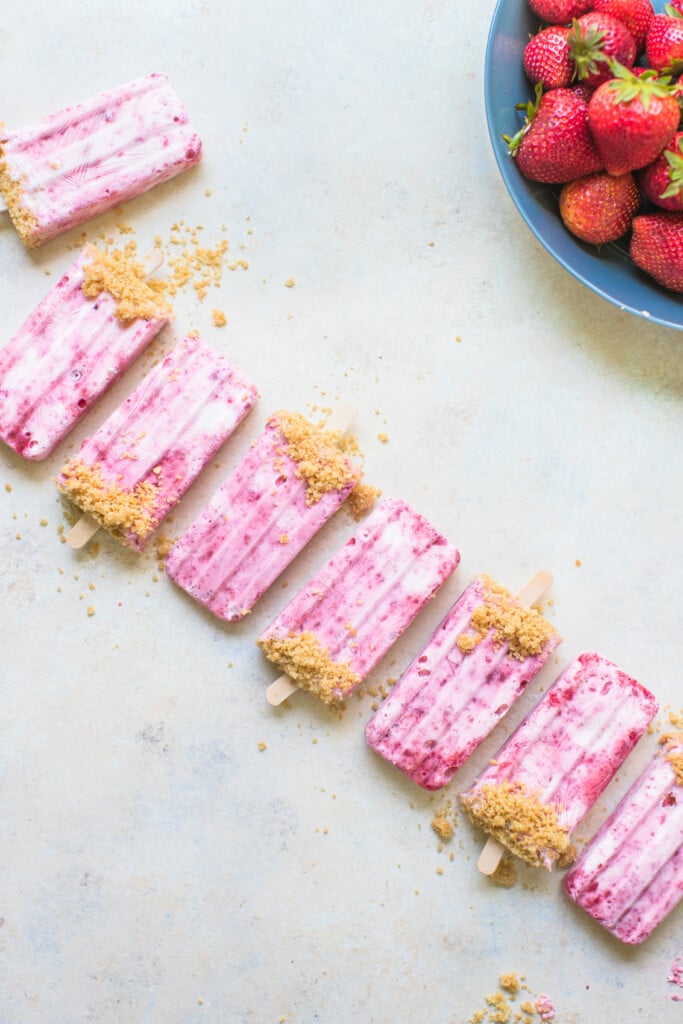 strawberry shortcake popsicle with vanilla wafer crust