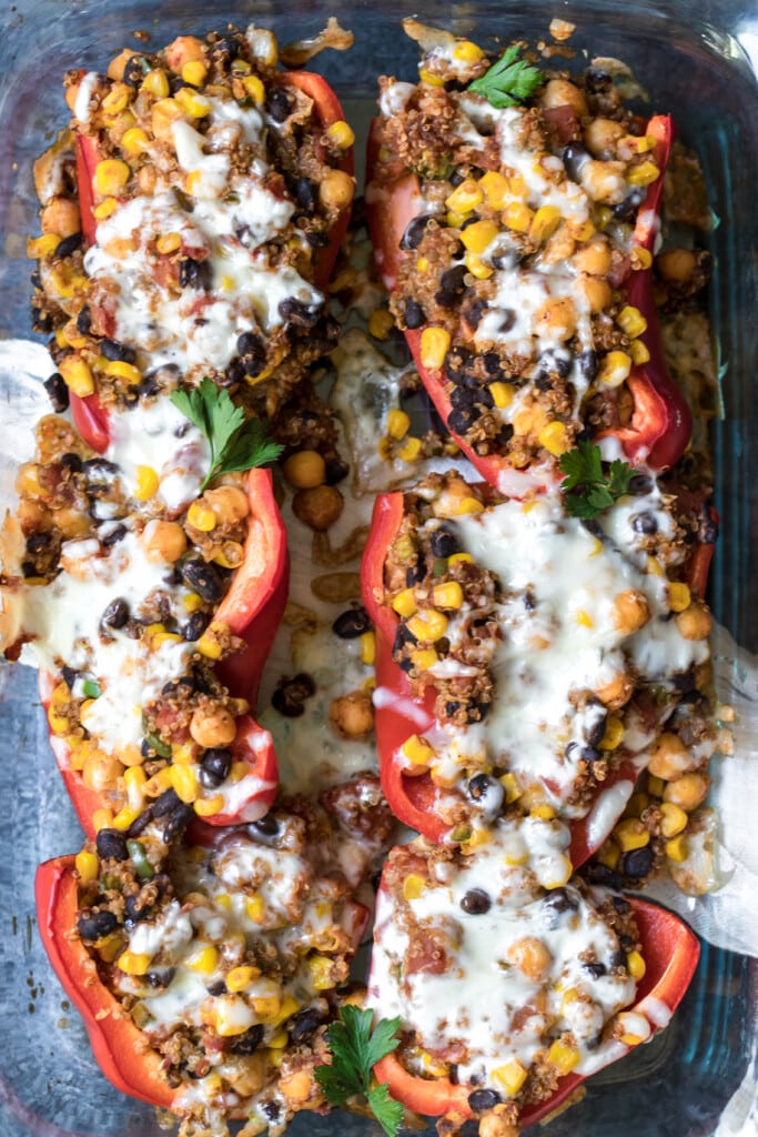 quinoa stuffed bell peppers topped with cheese