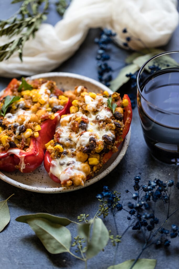 quinoa stuffed bell peppers on a white plate