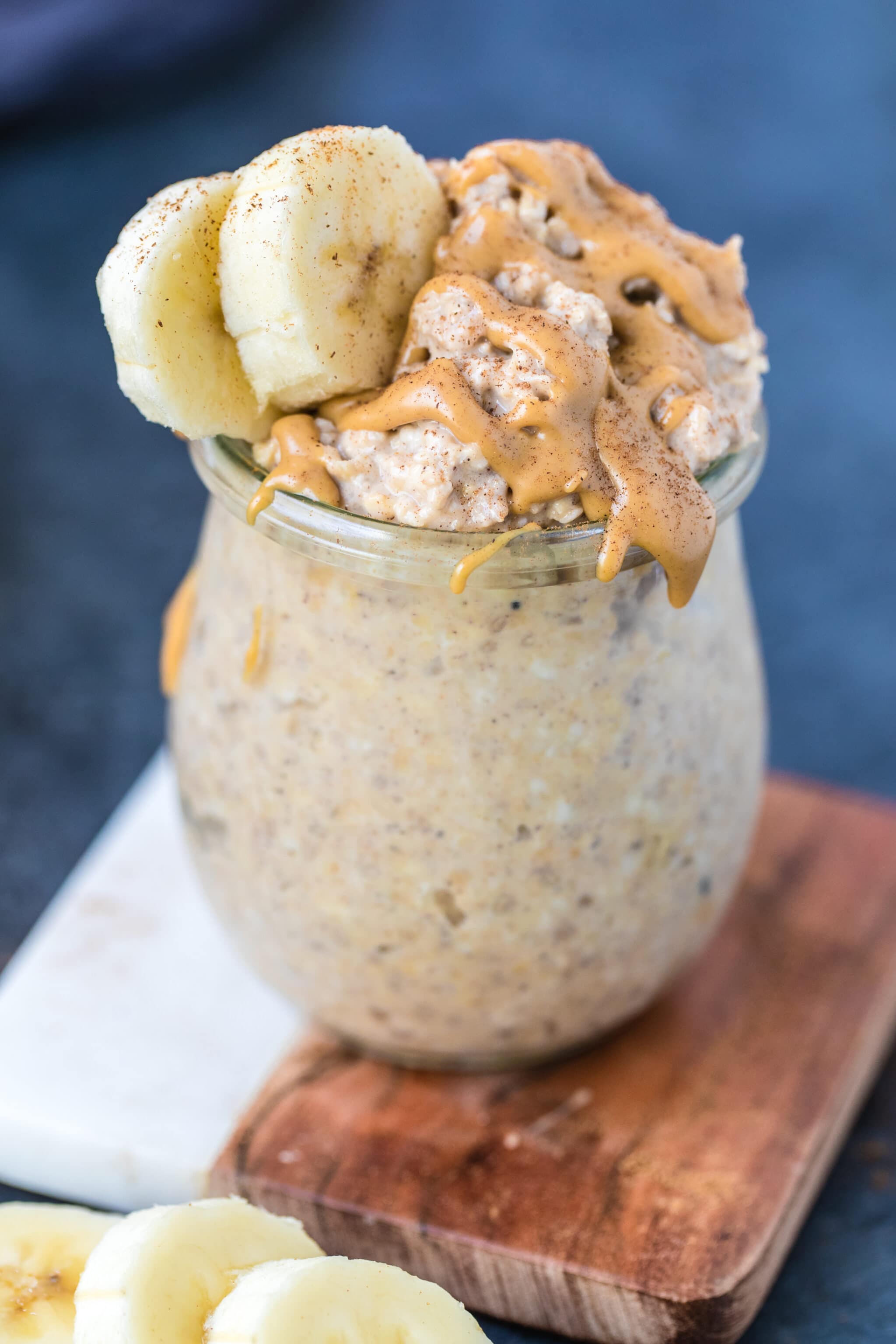 overnight peanut butter banana oats in a glass jar