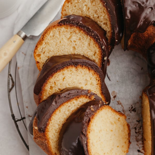 slices of rum bacardi bundt cake with chocolate ganache.