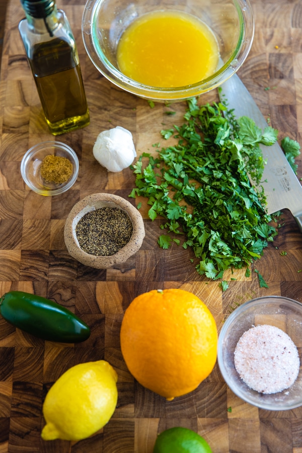 ingredients for carne asada marinade on a cutting board