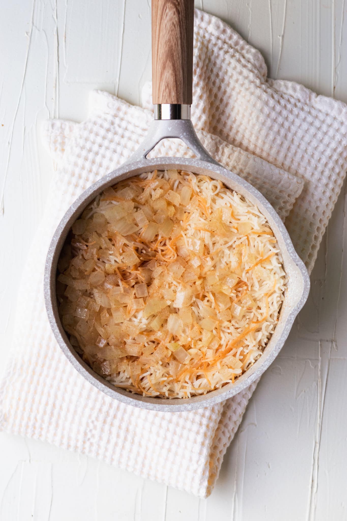 freshly cooked rice pilaf in a saucepan