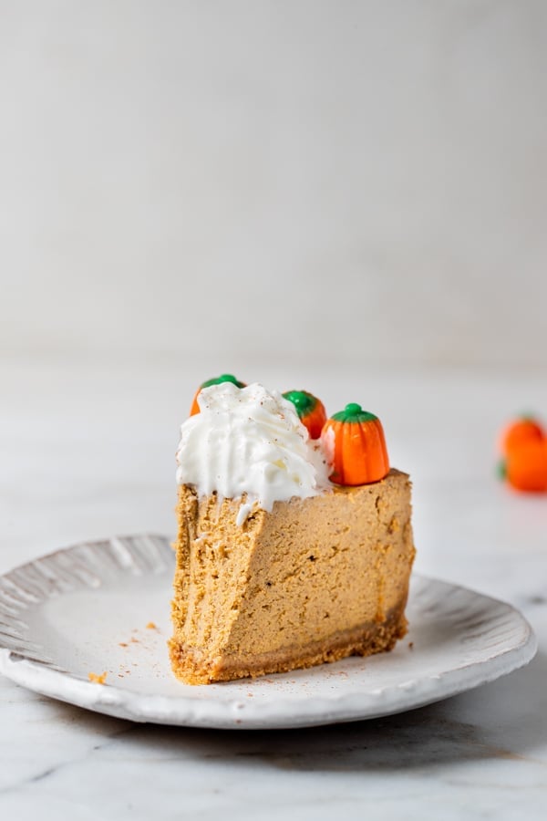 pumpkin cheesecake on a white plate