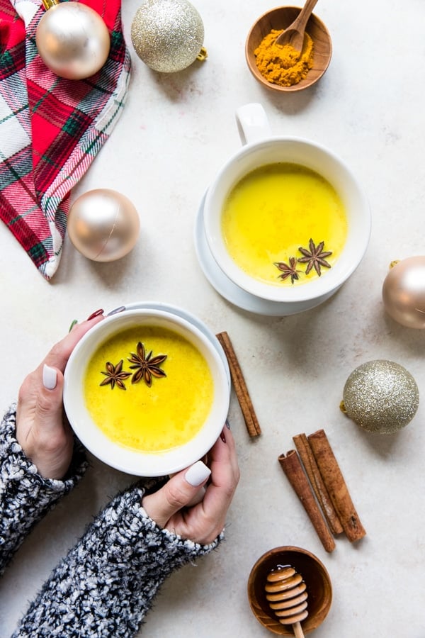 turmeric latte in white mugs