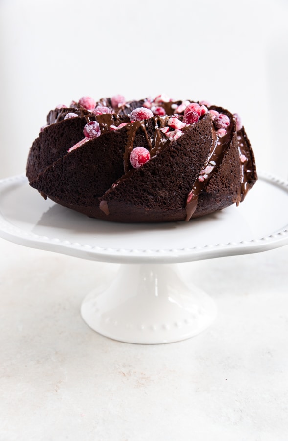 chocolate peppermint bundt cake on a cake stand