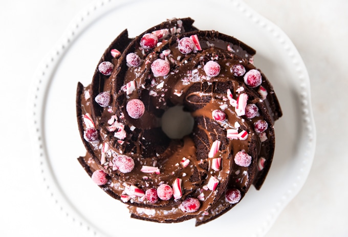 chocolate peppermint bundt cake on a cake stand