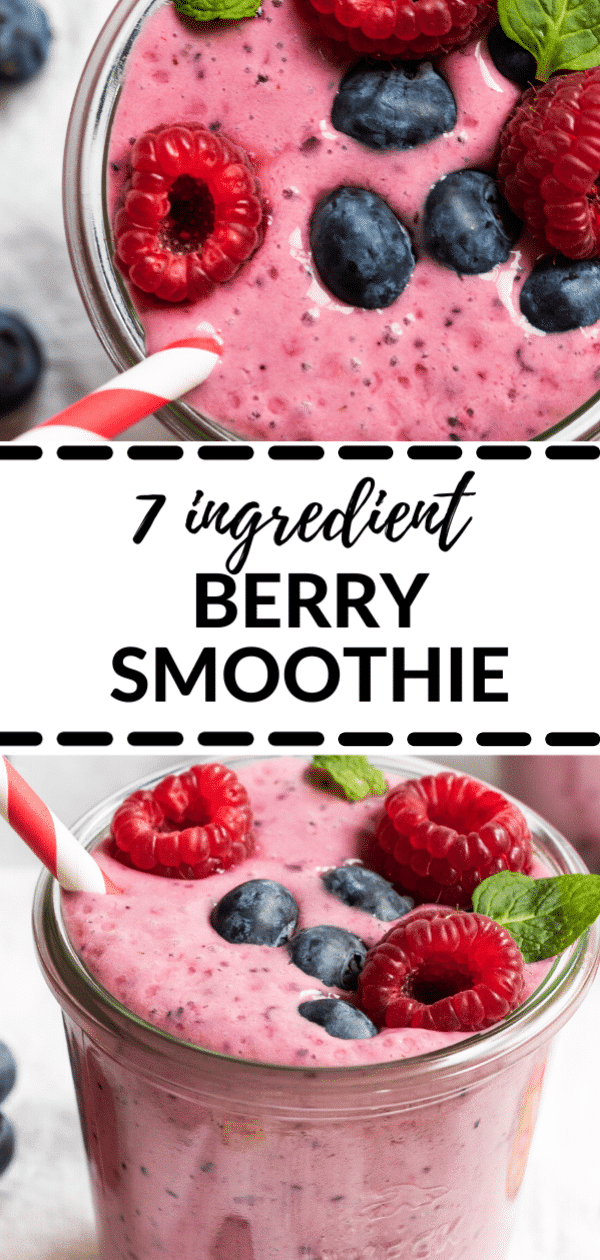 a berry smoothie in a glass topped with fresh berries