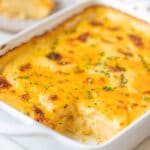a baking dish with scalloped potatoes