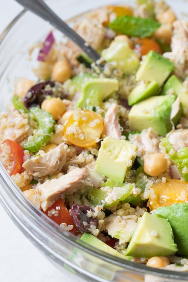 Easy Tuna Salad in a glass bowl with avocado on top