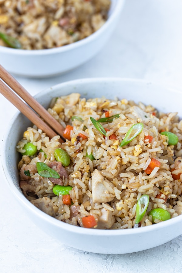 chicken fried rice in a white bowl