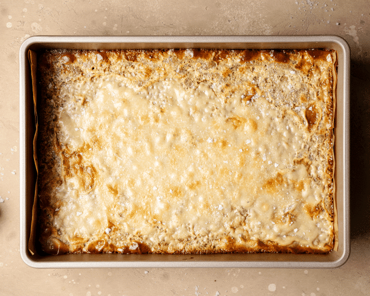 Coffee cookie bars in 9x13 pan after baking.