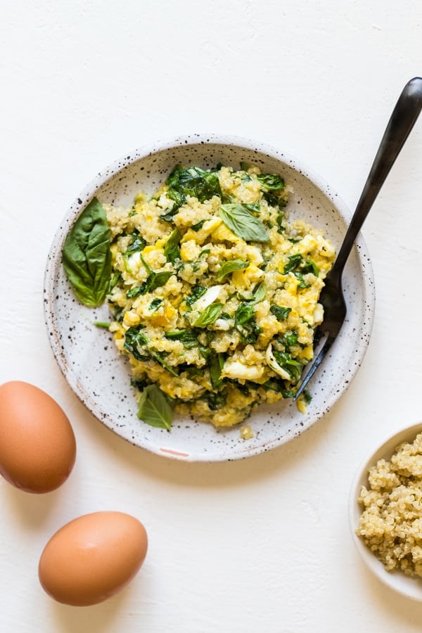 quinoa, eggs and spinach scramble on a plate