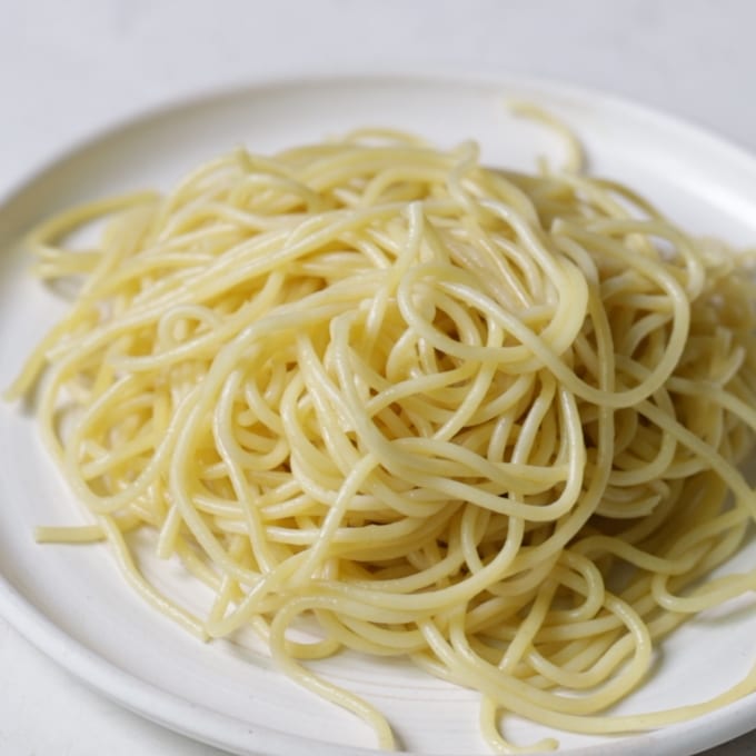 cooked pasta on a white plate