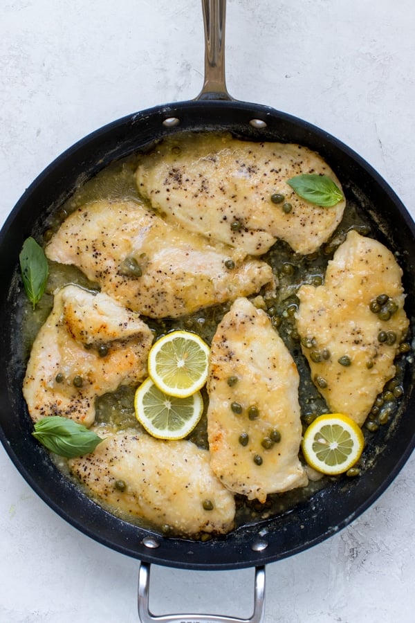 lemon chicken piccata in a large nonstick pan