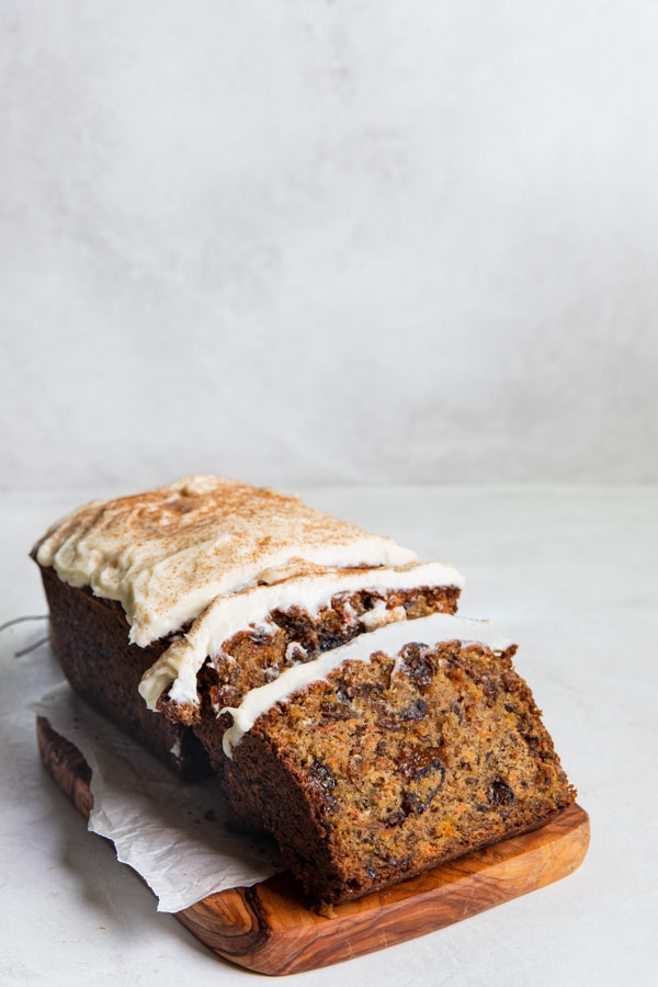 carrot cake bread with cream cheese frosting on top