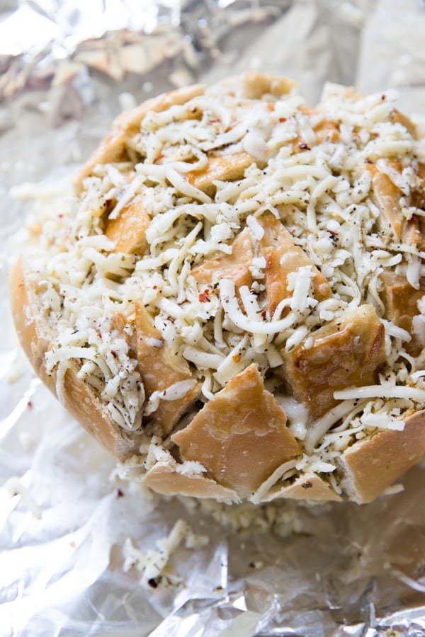 sourdough bread filled with shredded mozzarella cheese 