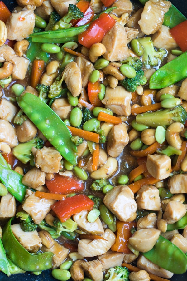 cashew chicken stir fry in a wok