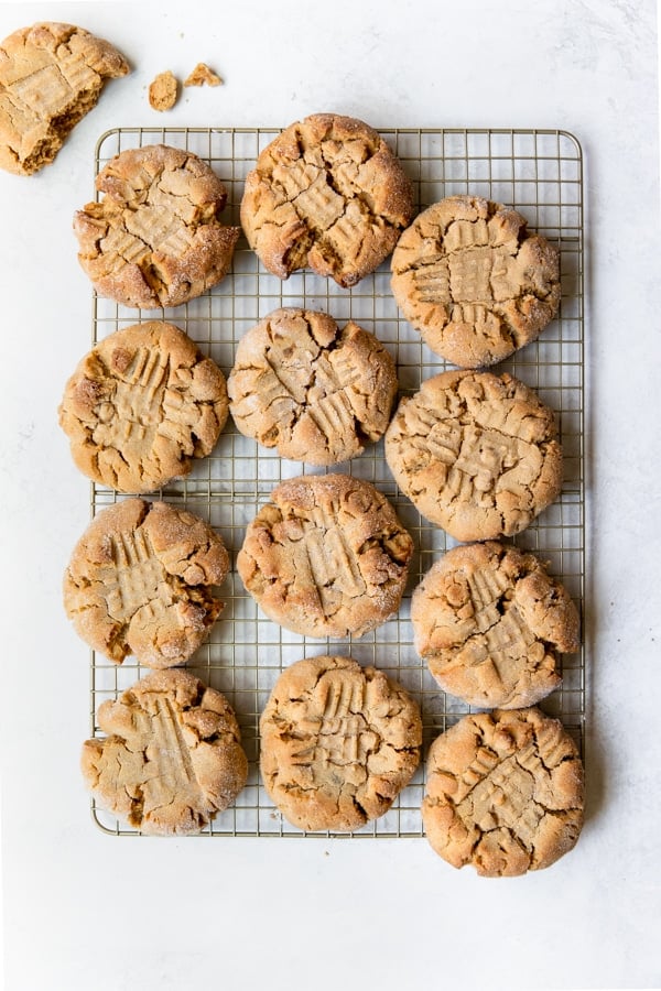 peanut butter cookies made with peanut butter chips on a cooling rack.