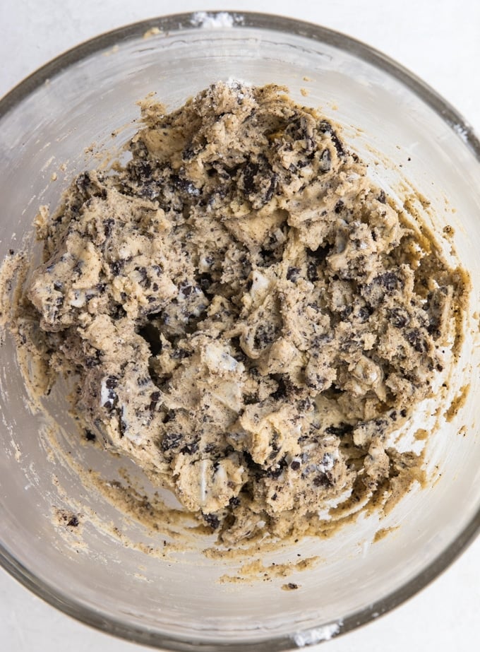 Cookie dough in a glass mixing bowl