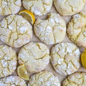 lemon crinkle cookies on parchment paper