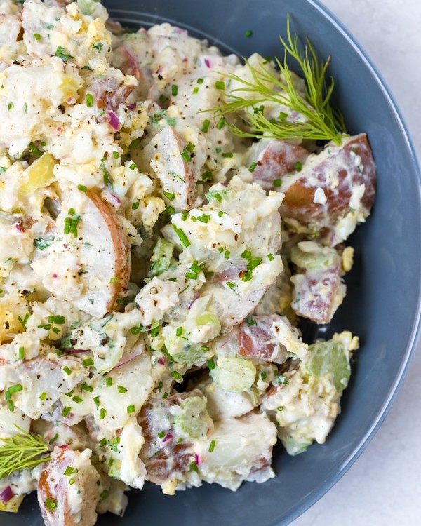 potato salad in a blue bowl