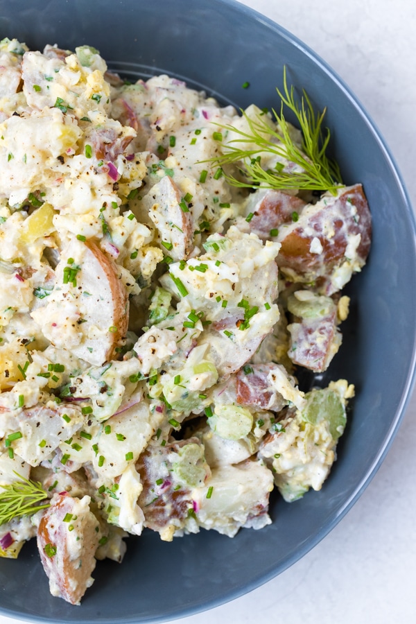 potato salad in a blue bowl