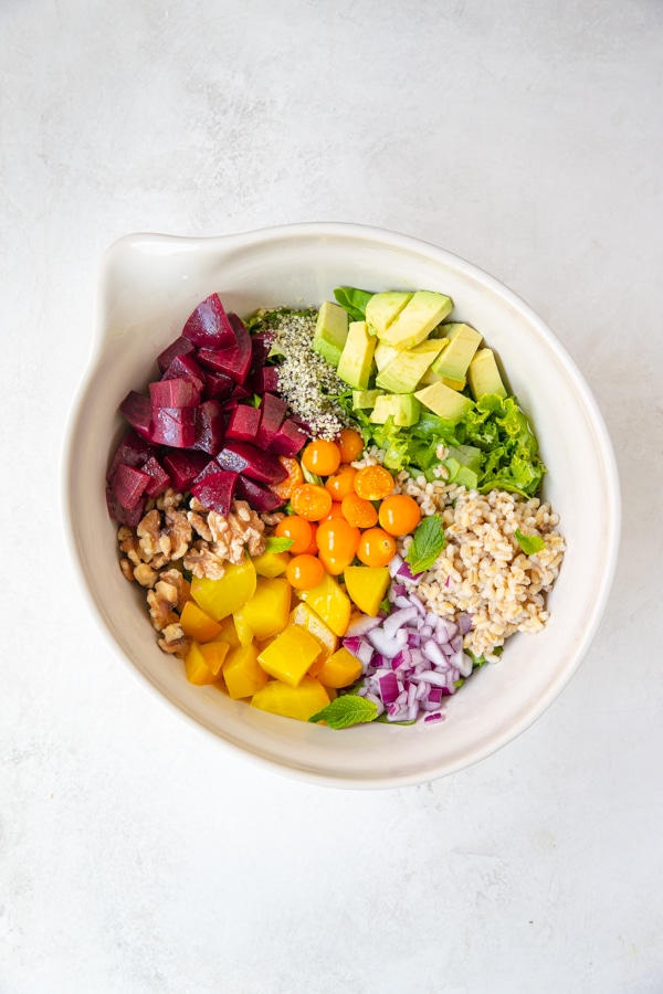 ingredients for beet salad in a large bowl