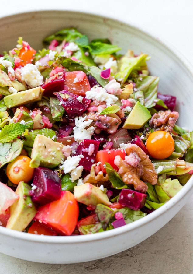 beet salad in a bowl topped with feta