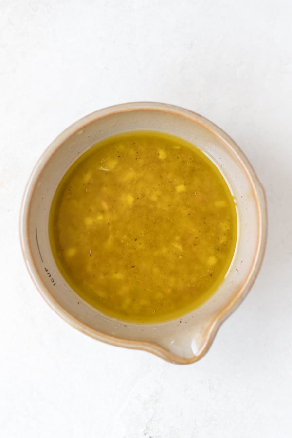 champagne vinaigrette in a tan bowl