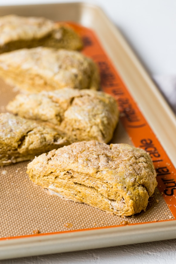 pumpkin scones on a baking sheet