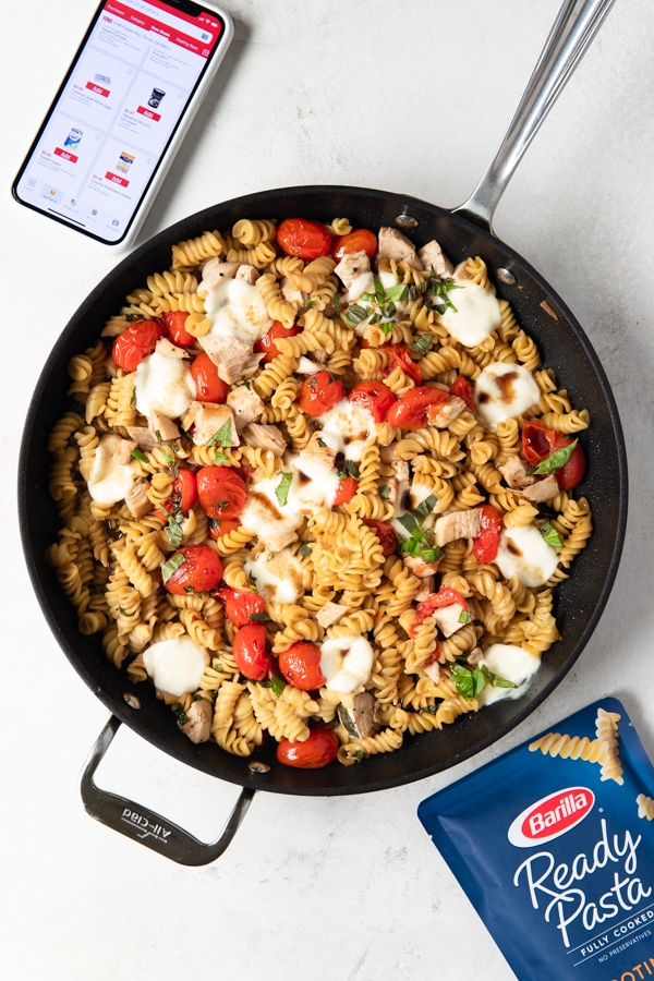 Chicken Caprese Pasta in a frying pan