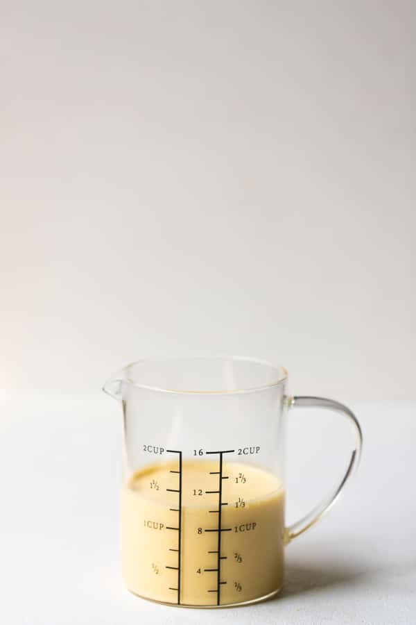 hollandaise sauce in a measuring cup