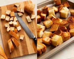 Cubed pieces of French bread being sliced on a wooden cutting board with a serrated knife, then toasted on a baking sheet until golden brown to make croutons.