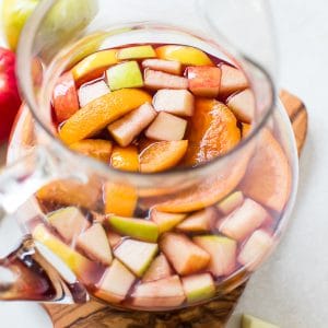 fall sangria in a glass pitcher
