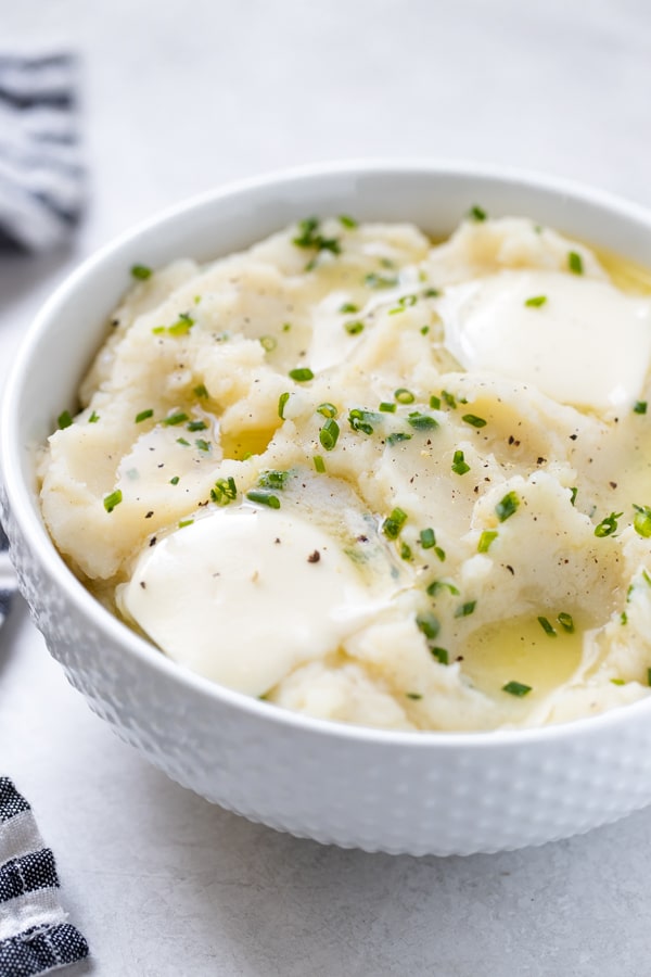 Instant Pot Mashed Potatoes in a white bowl 