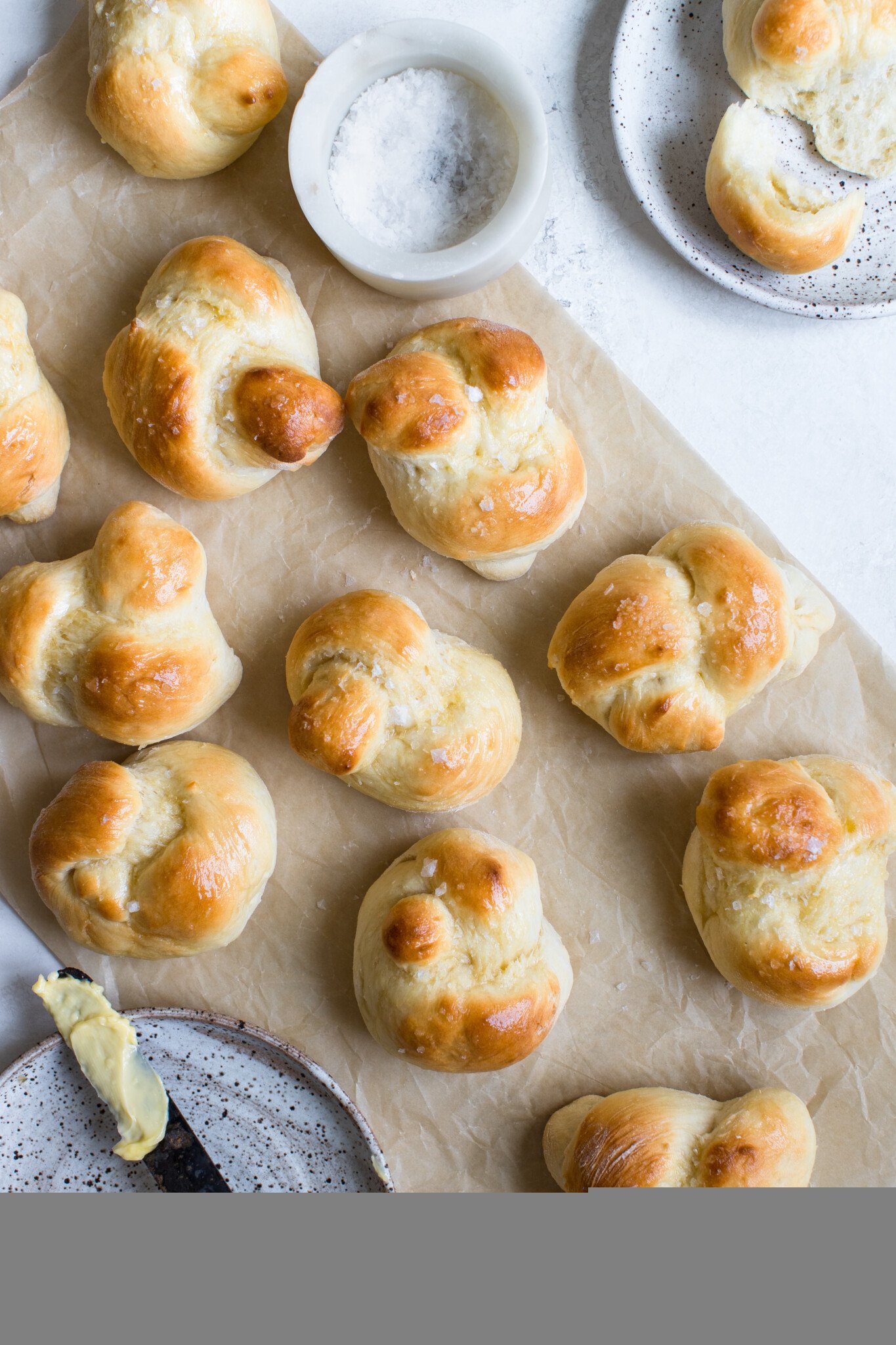 sweet dinner rolls on parchment paper