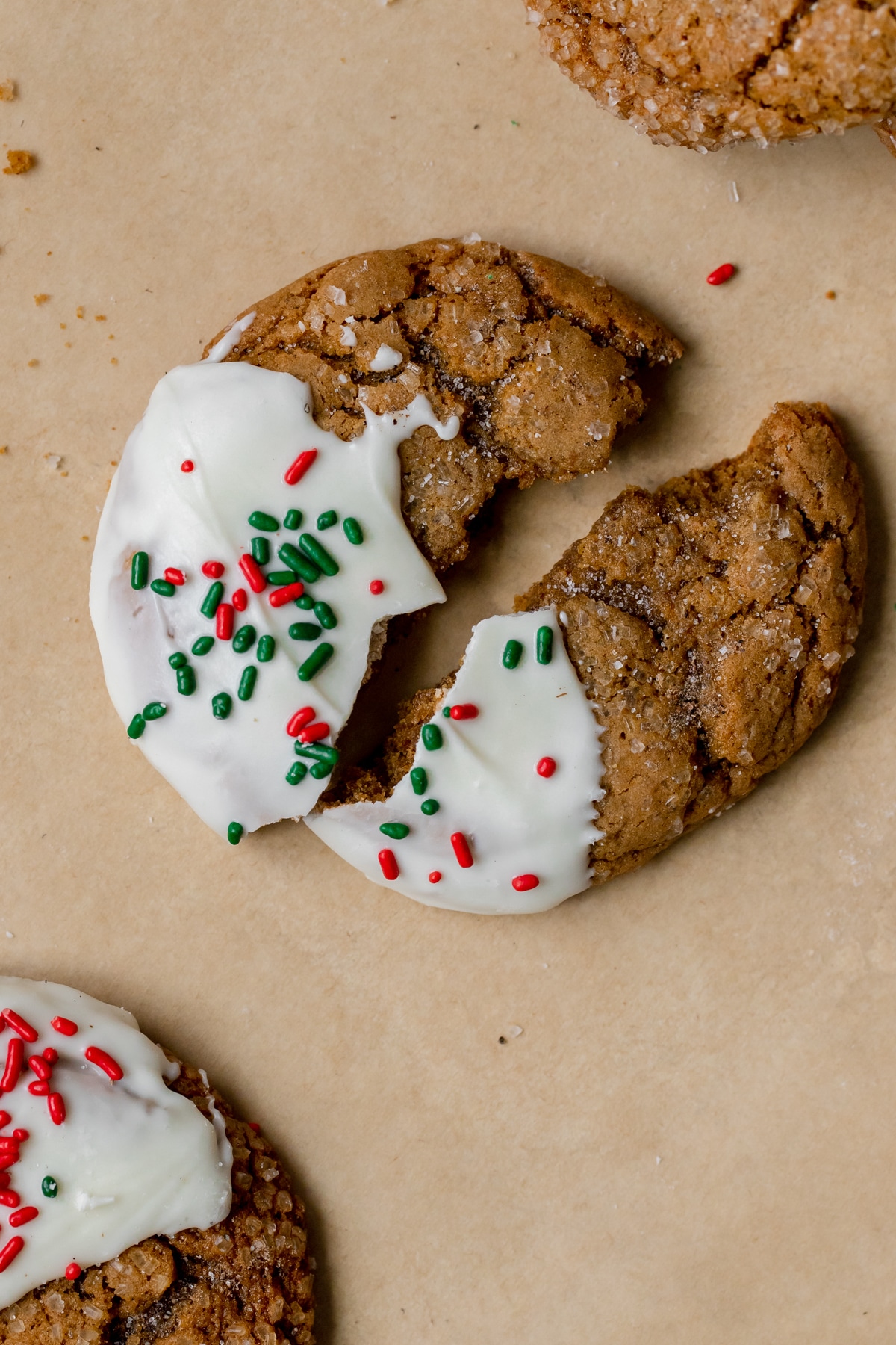 a molasses cookie dipped in white chocolate