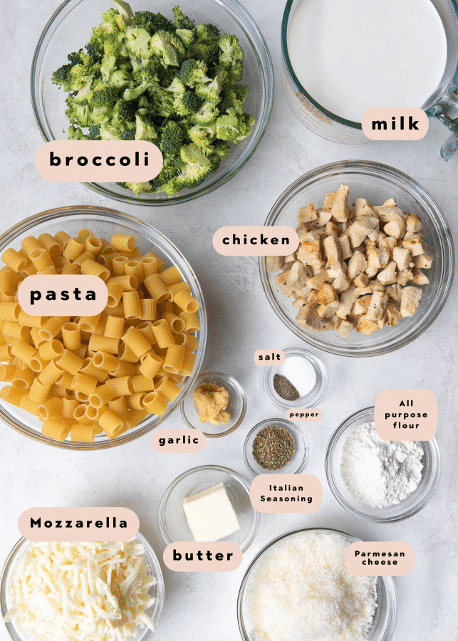 ingredients needed to make chicken alfredo pasta in glass bowls